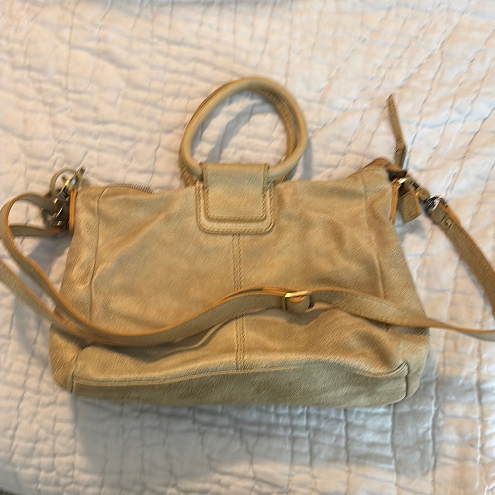 HOBO Tan Crossbody Bag with Adjustable Strap and Gold Hardware